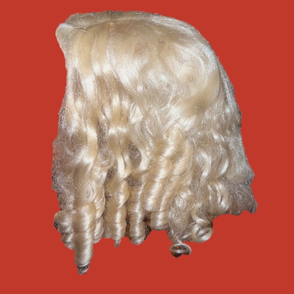 Big girl or women’s Blond ringlet Halloween or dress up wig.